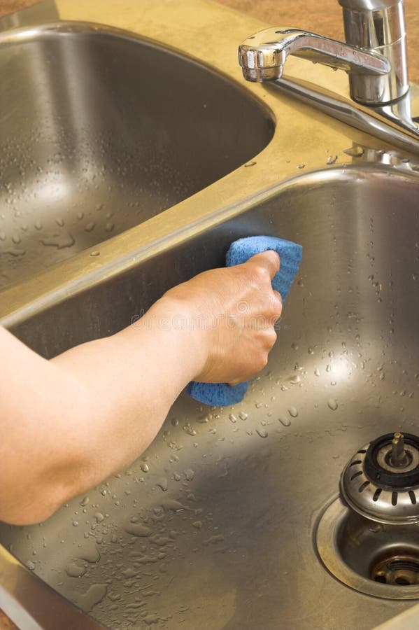 Washing the sink