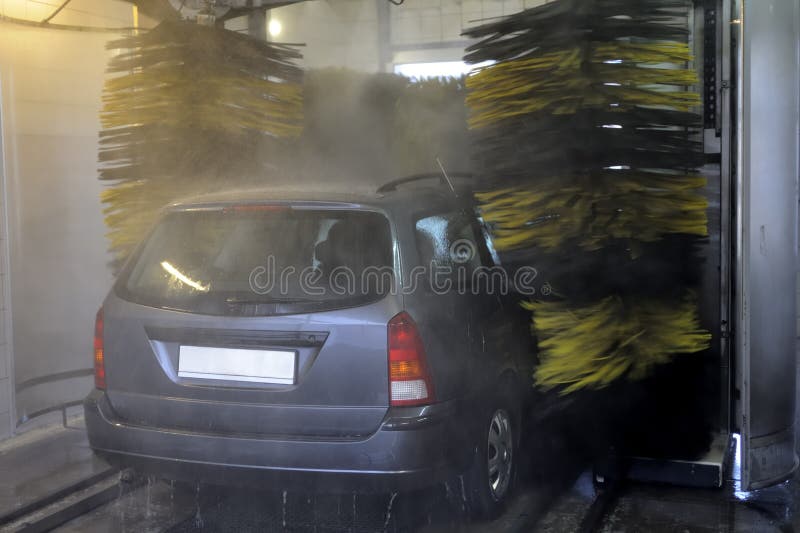 Washing vehicle in automatic car wash