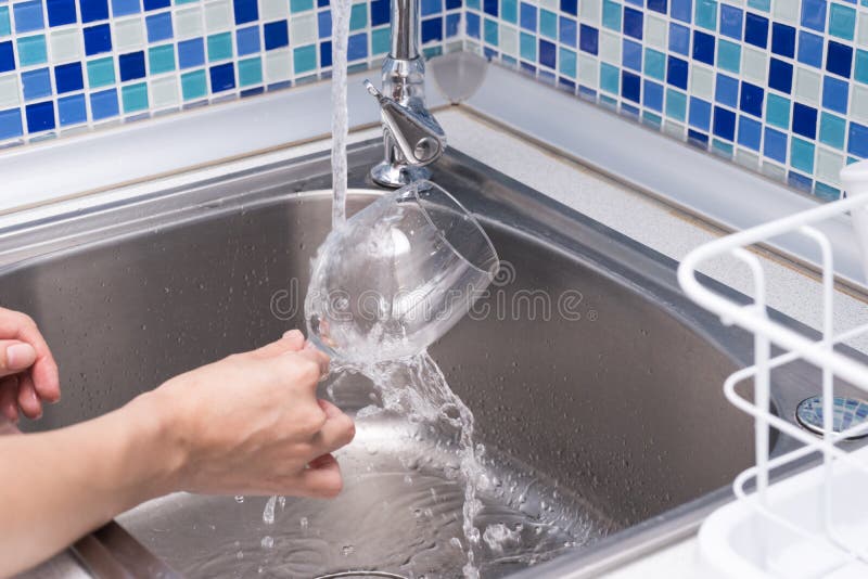Washing a wine glass stock image. Image of dirty, cleanup 107034295