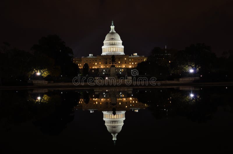 Washington DC - Capitol building and reflection. Washington DC - Capitol building and its reflection stock photos Washington DC - Capitol building and reflection. Washington DC - Capitol building and its reflection stock photos