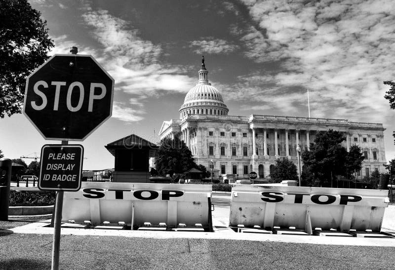 Washington, DC - June 01, 2018: Safety barriers and stop sign in front of United States Capitol royalty free stock photography Washington, DC - June 01, 2018: Safety barriers and stop sign in front of United States Capitol royalty free stock photography