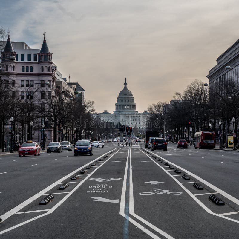 Washington, DC, USA — February 3, 2020. A photo looking down Pennsylvania Avenue toward the Capitol Building on a winter morning. Washington, DC, USA — February 3, 2020. A photo looking down Pennsylvania Avenue toward the Capitol Building on a winter morning