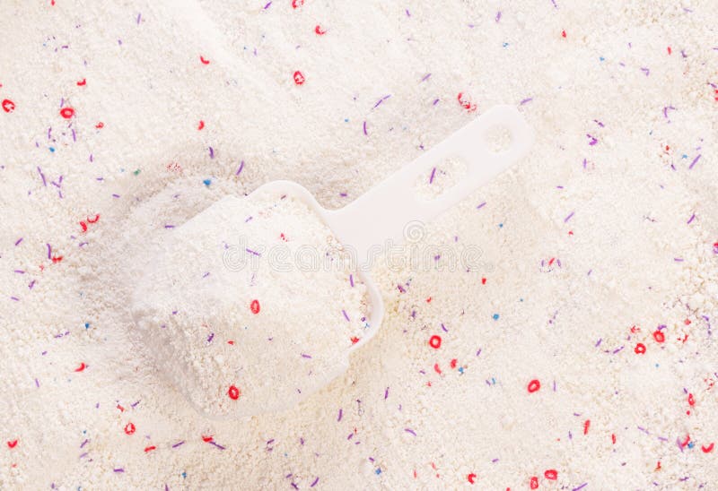 Waspoeder met het meten lepelclose-up stock afbeelding