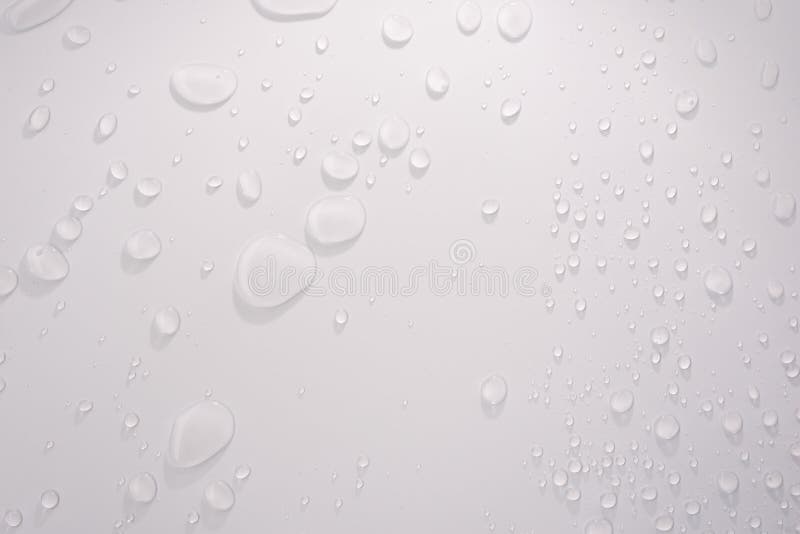 Wassertropfen auf weißem Hintergrund lizenzfreie stockfotos Wassertropfen auf weißem Hintergrund lizenzfreie stockfotos