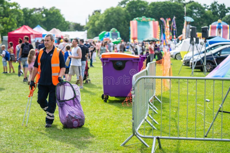 Bedford, Bedfordshire, UK June 2 2019. A waste collector, sanitation worker, dustman, binman or garbageman is a person employed by stock image Bedford, Bedfordshire, UK June 2 2019. A waste collector, sanitation worker, dustman, binman or garbageman is a person employed by stock image