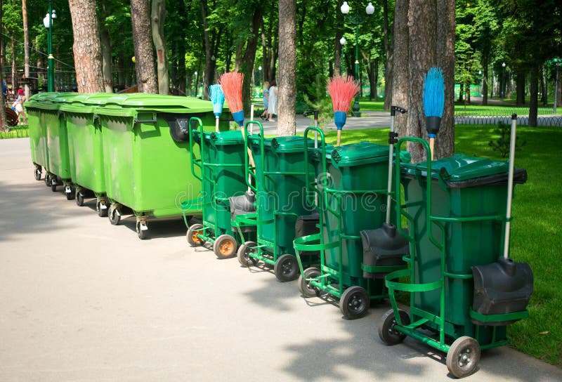 Waste Containers and Yard Keeper`s Inventory in the Park. Stock Photo
