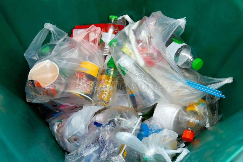 Waste, plastic garbage waste in bin green, trash, rubbish, pollution from waste stock images