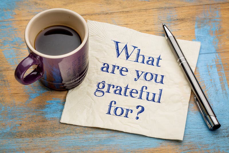 What are you grateful for? A question on a napkin with a cup of espresso coffee. What are you grateful for? A question on a napkin with a cup of espresso coffee.
