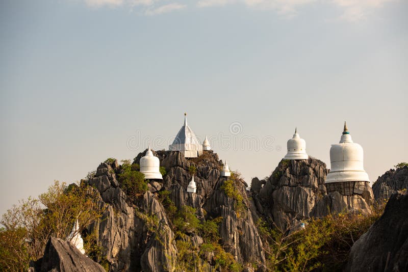 Wat chaloem phrachomklao rachanuson that the tample and pagoda on rock mountain in sunshine beautiful