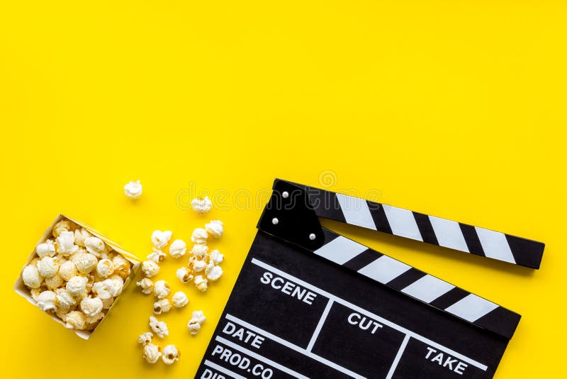 Watch Film in Cinema with Popcorn and Clapperboard on Yellow Background Top  View Stock Photo - Image of scene, filmmaking: 153931954