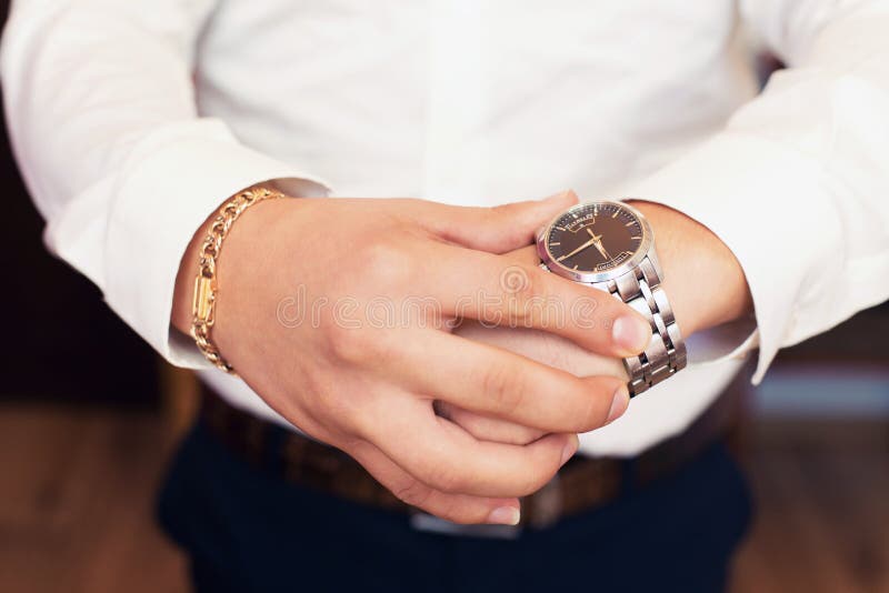 Watch on a hand at the man stock photo. Image of ceremony 66289546