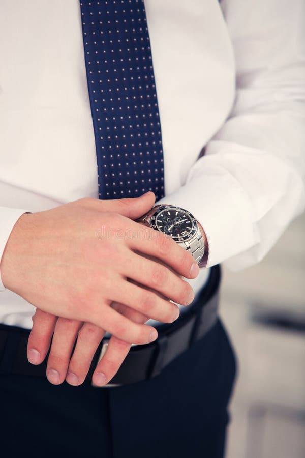 Watch on a hand at the man stock photo. Image of cuff - 66289746