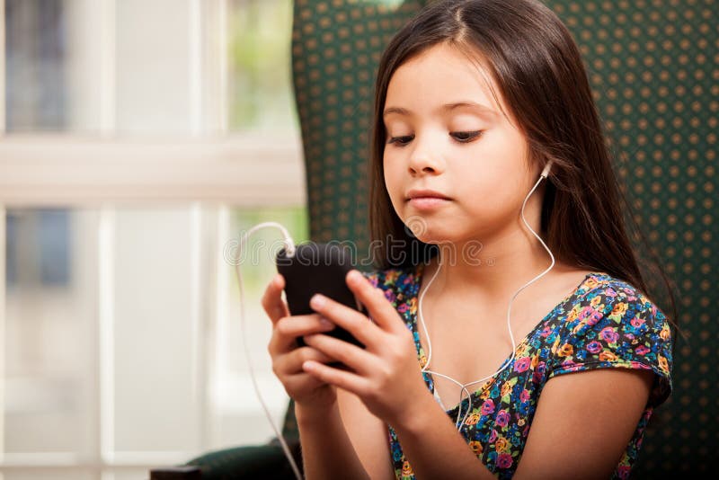 Watching a movie on a cell phone stock photos Watching a movie on a cell phone stock photos