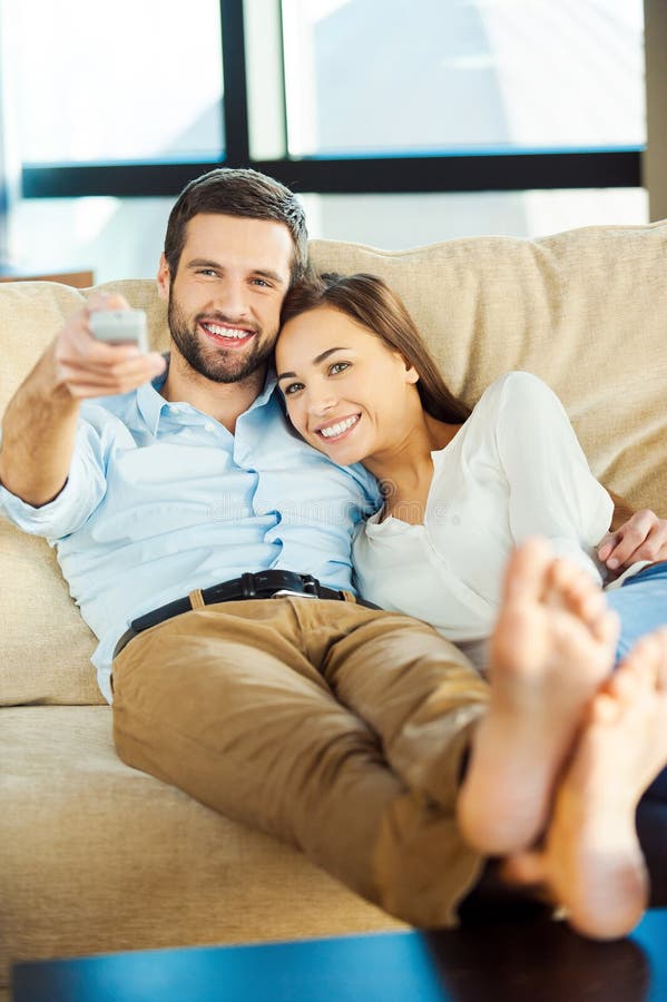 Young couple watching tv