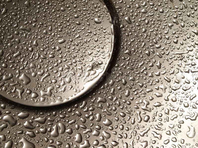 Beautiful drops of water on metal