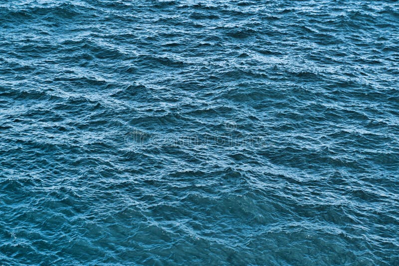Water background texture. Sea surface in sunset light royalty free stock photos Water background texture. Sea surface in sunset light royalty free stock photos
