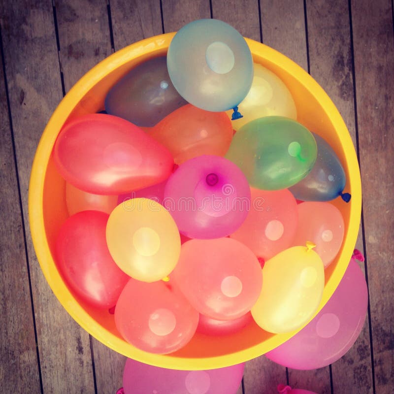 Bucket of water balloons stock image. Image of balloons 8787103