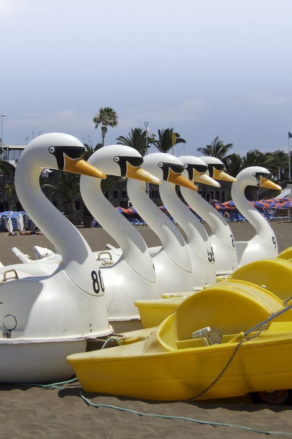 Water bikes on the beach stock photo. Image of tourism 13393660