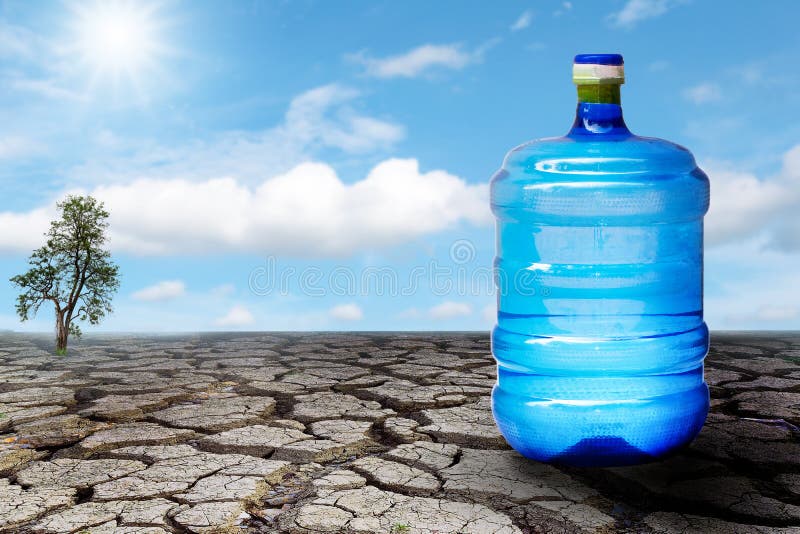 Water Bottle On The Cracked Land. Stock Photo Image of plastic, land