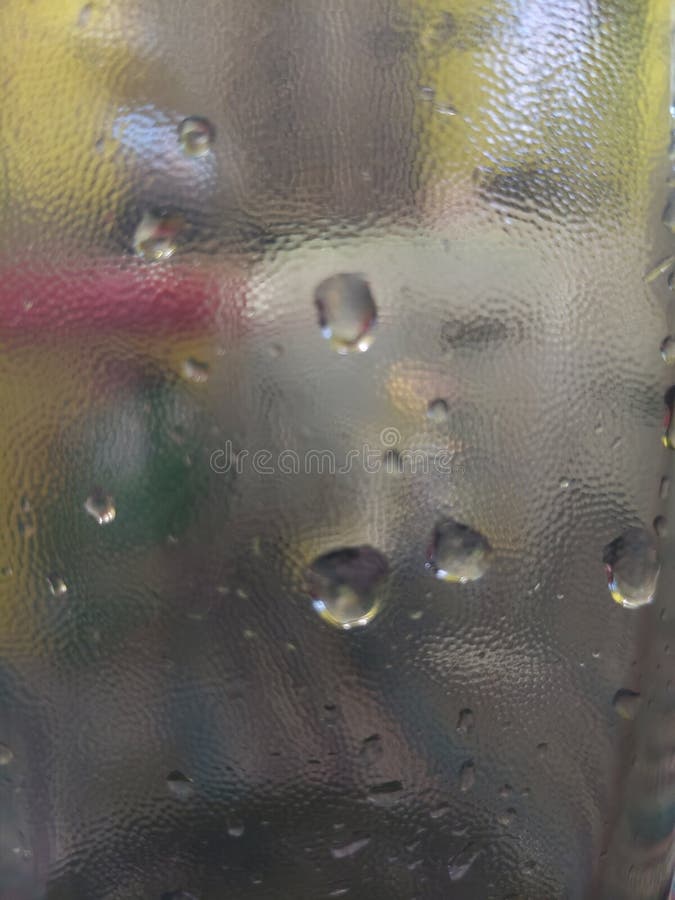 Water in the bottle mirror bottled rain happy play imagenes de archivo