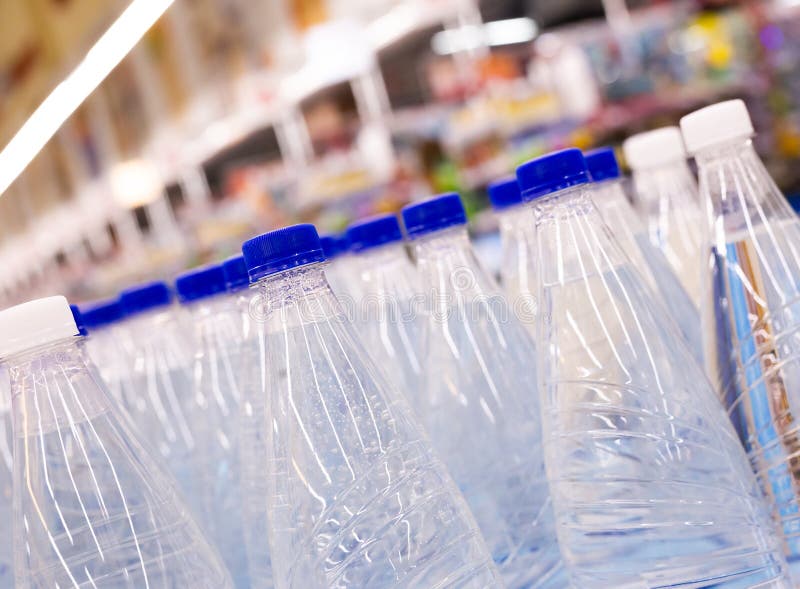 Water Bottles with Blue Caps in Supermarket Stock Photo Image of
