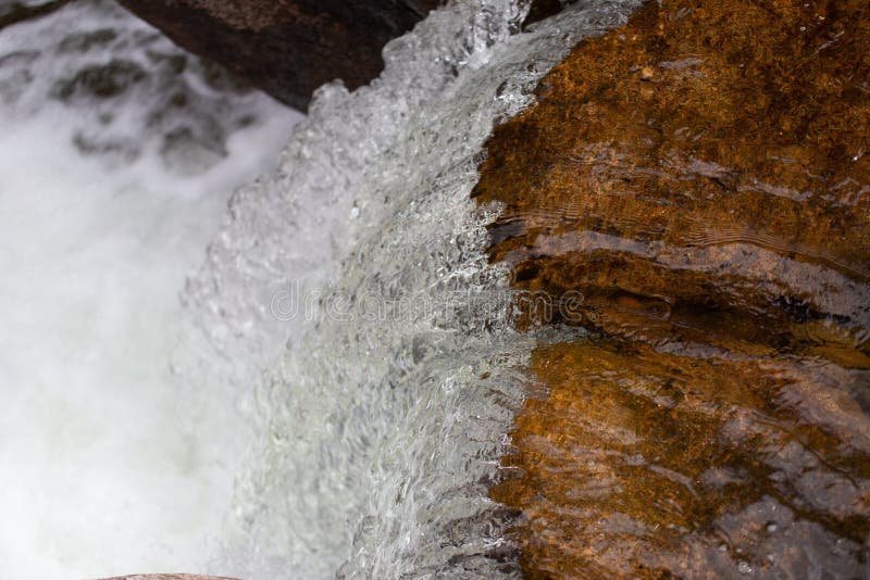 Water cascading over a stone royalty free stock image Water cascading over a stone royalty free stock image