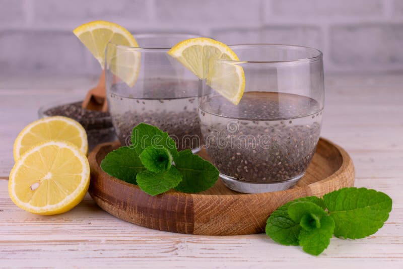 Water with Chia Seeds and Lemon and Mint in Glasses. Stock Photo