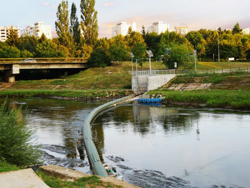 Water clean-up from floating plastic garbage stock photography