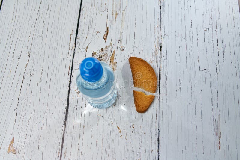 Water, Crackers and Drying on the Background of Boards. Stock Photo Image of healthy, circle