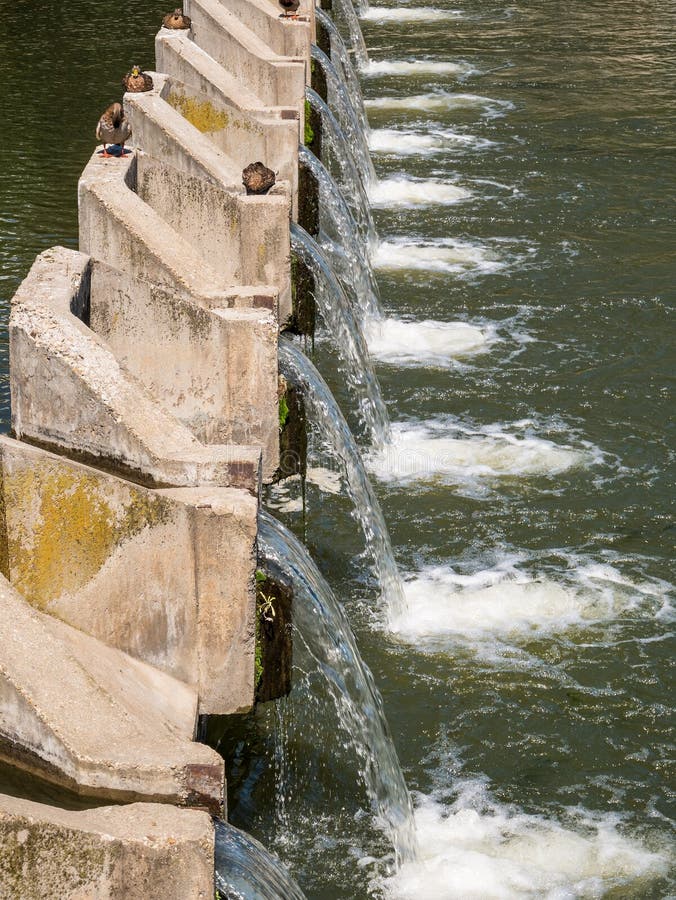 Water dam on Dambovita river in Bucharest, Romania stock images