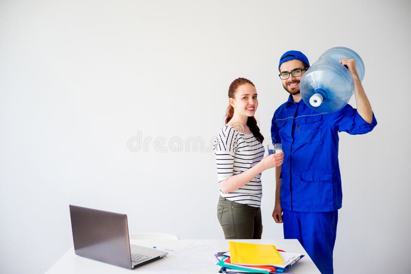 Water delivery into office stock photo. Image of uniform 95921676