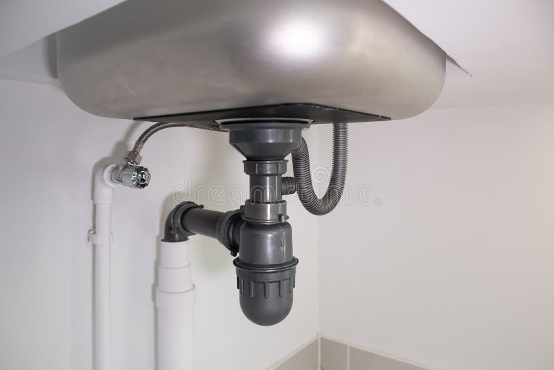 Water Drain Pipe Under Kitchen Sink and Faucet. Stock Image Image of