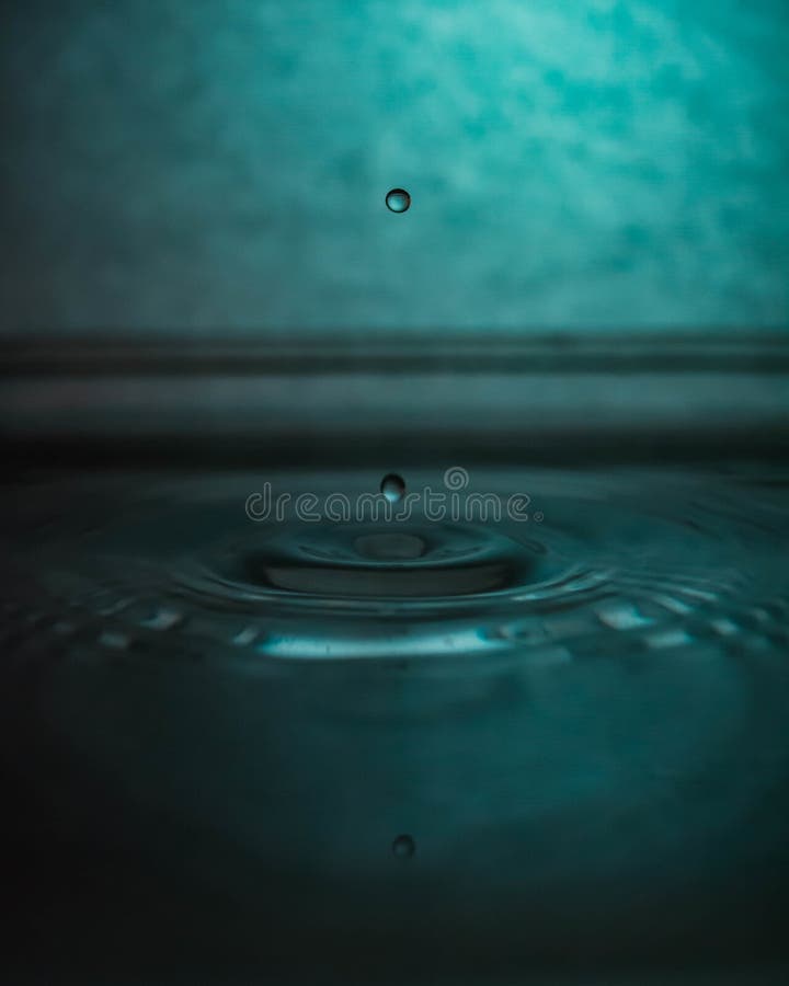 Water Dripping and Splashing with a Blue Effect Stock Photo Image of natural, freshness 188462400