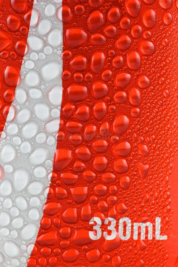 Aluminum soft drink can with water droplets close up over white. Aluminum soft drink can with water droplets close up over white
