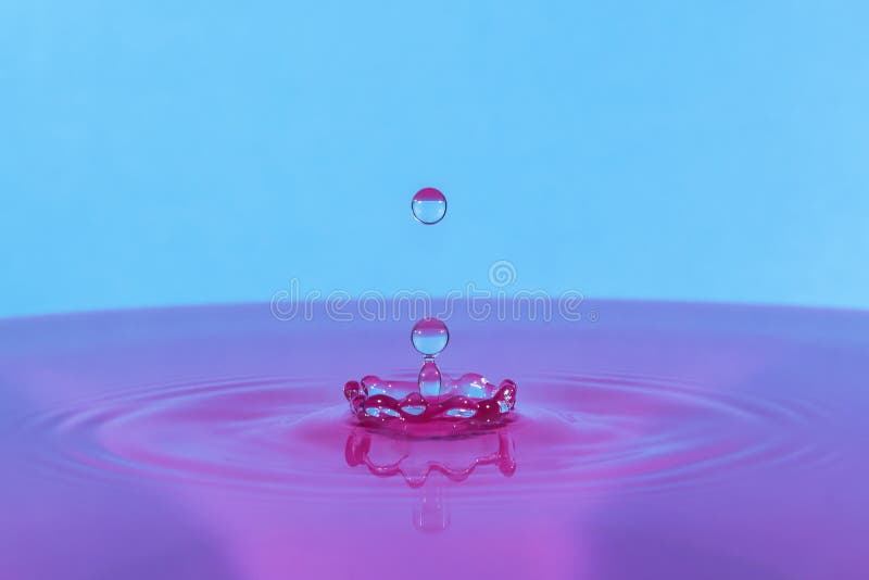 Water Drop Pink Blue royalty free stock photo