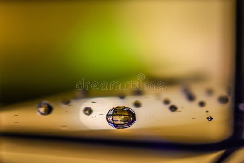 A Reflection of the Water Drop on the Plane Surface Made a Crystal