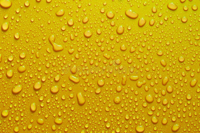 Water Drop Texture Close-up on Yellow Matte Background Stock Image - Image  of abstract, macro: 151675953