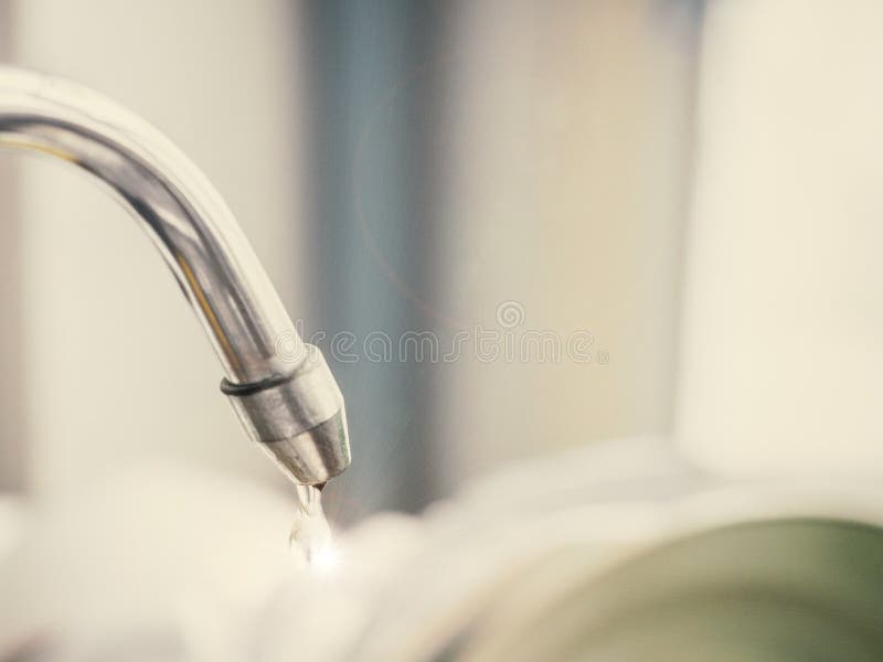 Water drop , water leaking from tap after clean dish , think for stock image
