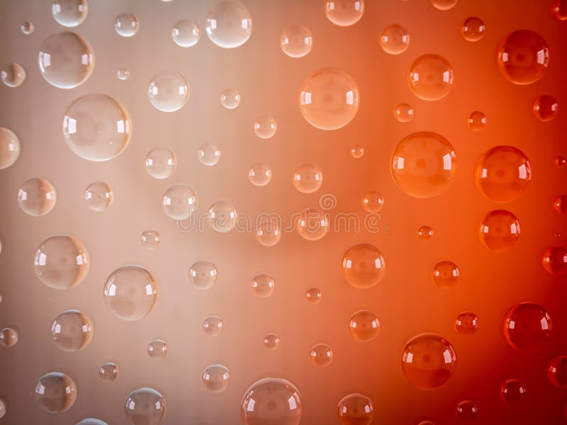 Water Droplet Like Bubble on Glass with Orange White Background Stock