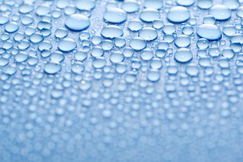 Water drops on a blue background. Window color reflection background stock images, royalty-free photos and pictures
