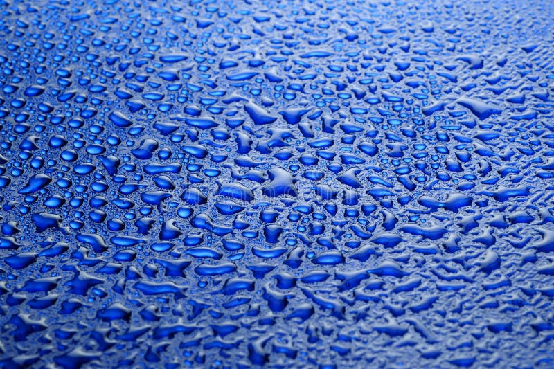 Water drops on a blue background. Window color reflection background stock images, royalty-free photos and pictures
