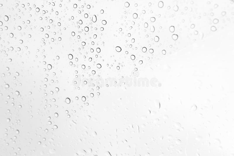 Water drops on glass , black and white