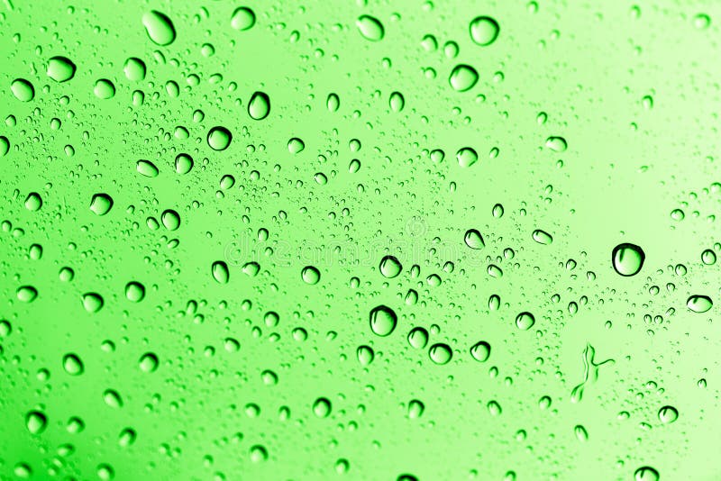 Water drops on green glass stock photo. Image of environment - 104653180