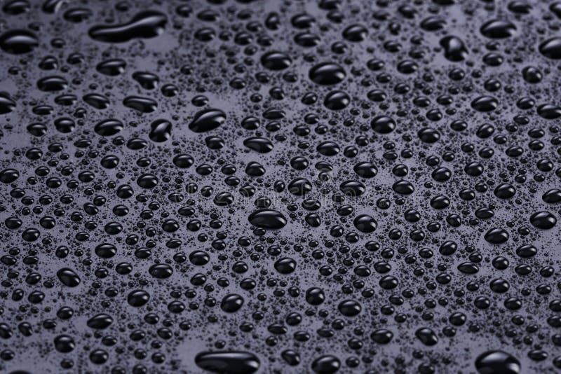 Water Drops on Hydrophobic Plastic Surface Stock Photo Image of black