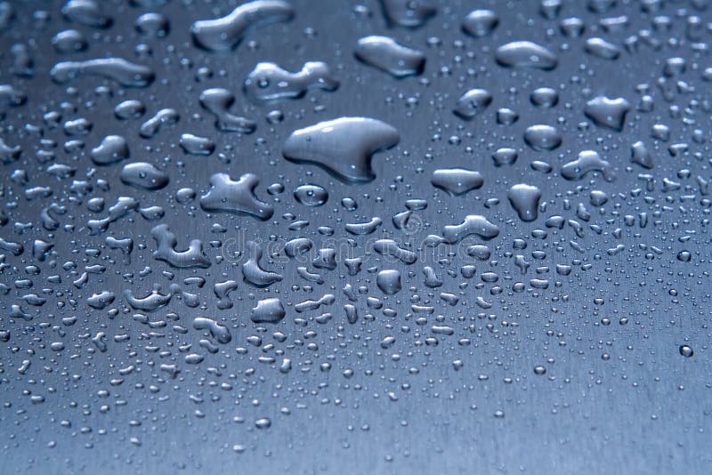 Water drops on the metal closeup