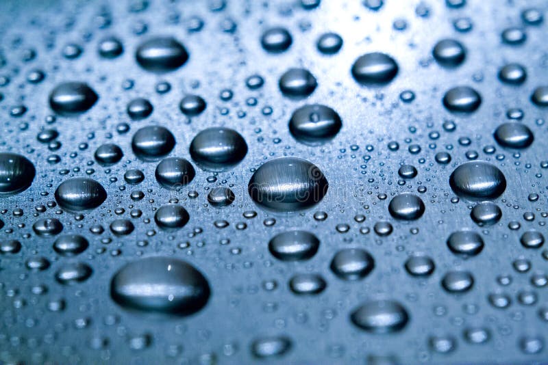 Water drops on the metal closeup