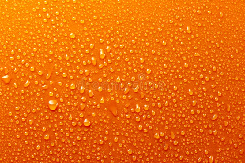 Water Drops On Orange Background Texture dark