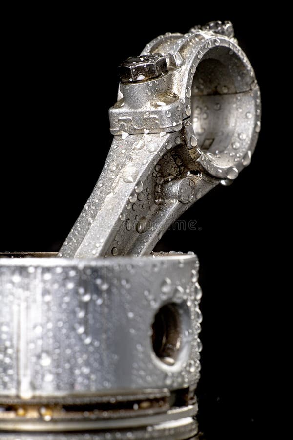 Piston of an Internal Combustion Engine in a Cut Aluminum Cylinder