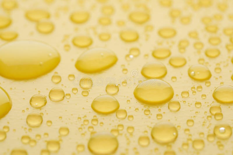 Water Drops on Yellow Background, Closeup Stock Photo Image of view