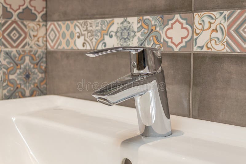 Water faucet, bathroom faucet and kitchen faucet. Chrome-plated metal. close up royalty free stock photos Water faucet, bathroom faucet and kitchen faucet. Chrome-plated metal. close up royalty free stock photos